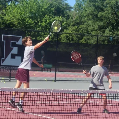 boys playing tennis